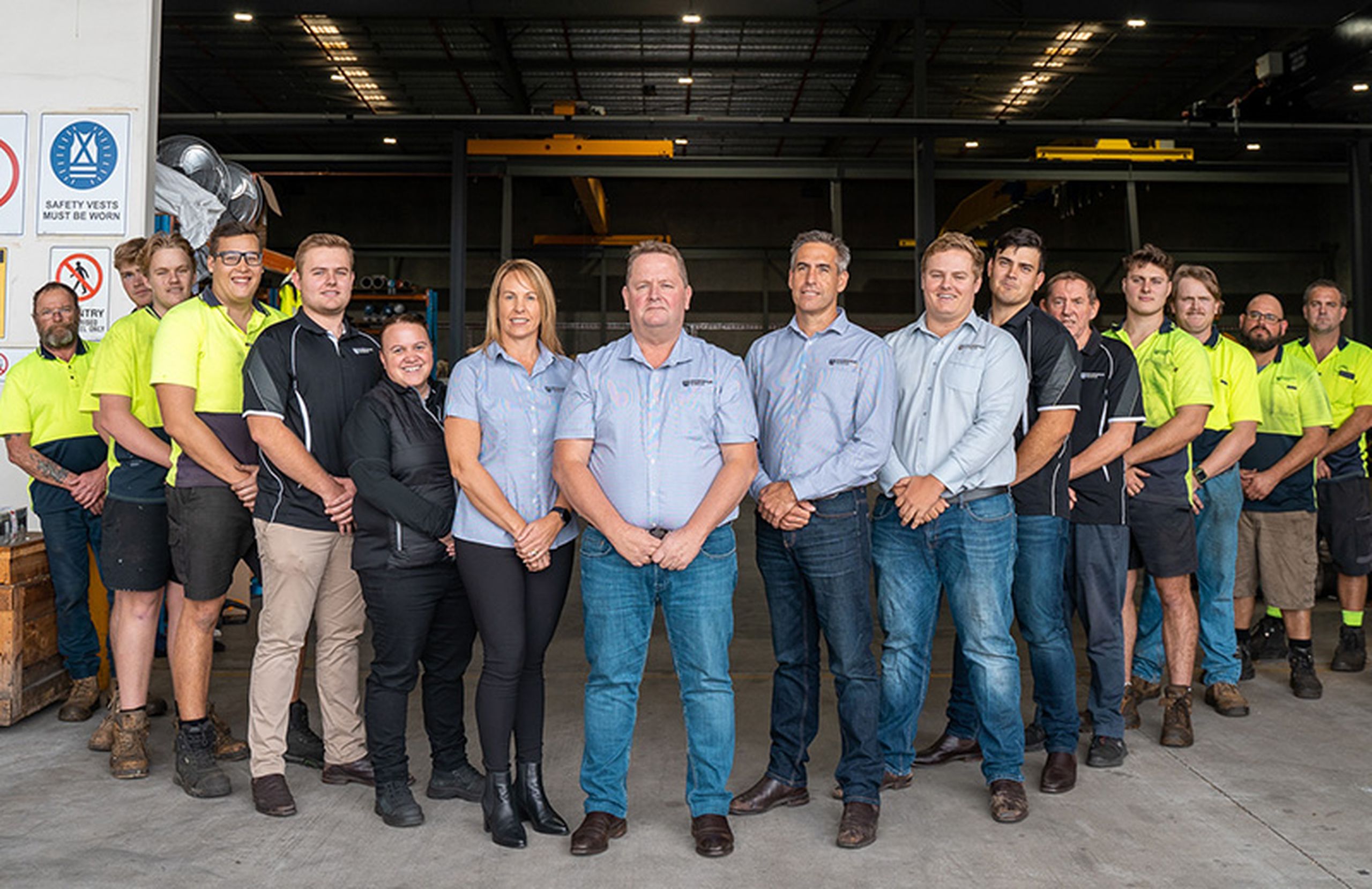 Group of professionals standing together at Ovako facility